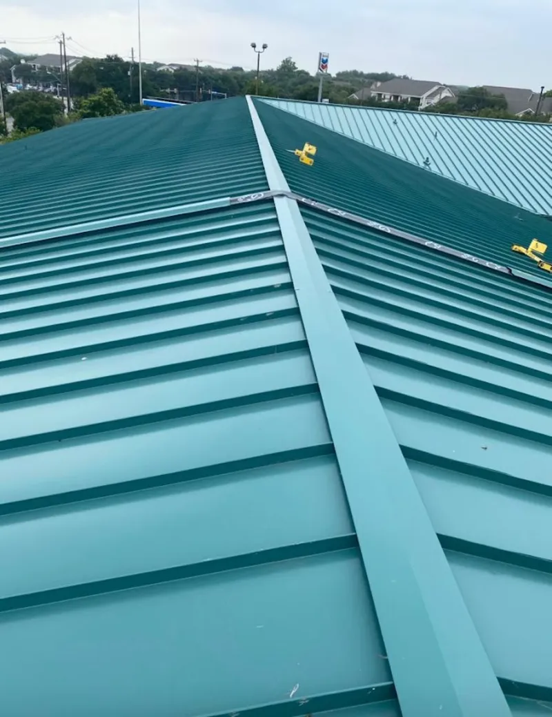 Green commercial metal roof ridge and valley for Metal Roof Repair in Parkway